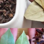 A small bowl filled with dried bay leaves and cloves, ready to be mixed for seasoning or use in cooking.