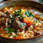 Hearty Beef and Barley Soup with tender beef, vegetables, and barley in a rich, savory broth.